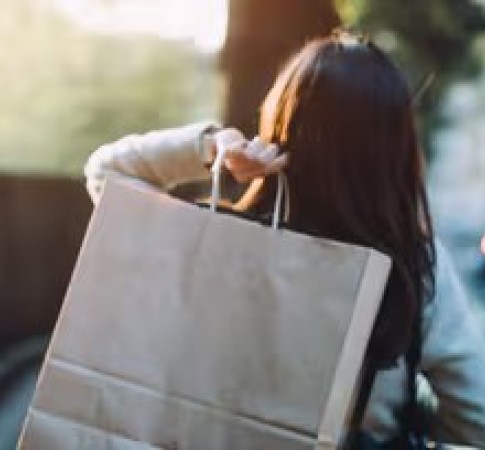 a woman holding a bag